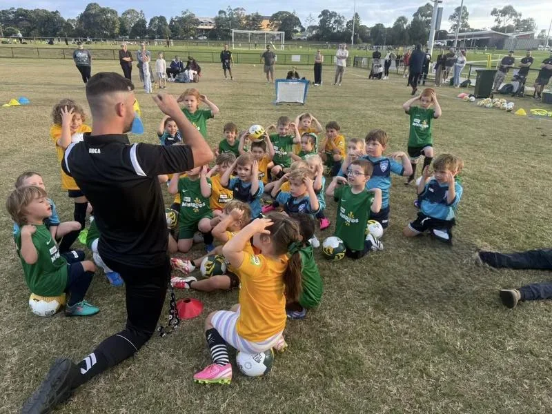 Junior football players at a Shellharbour City Football Club training session